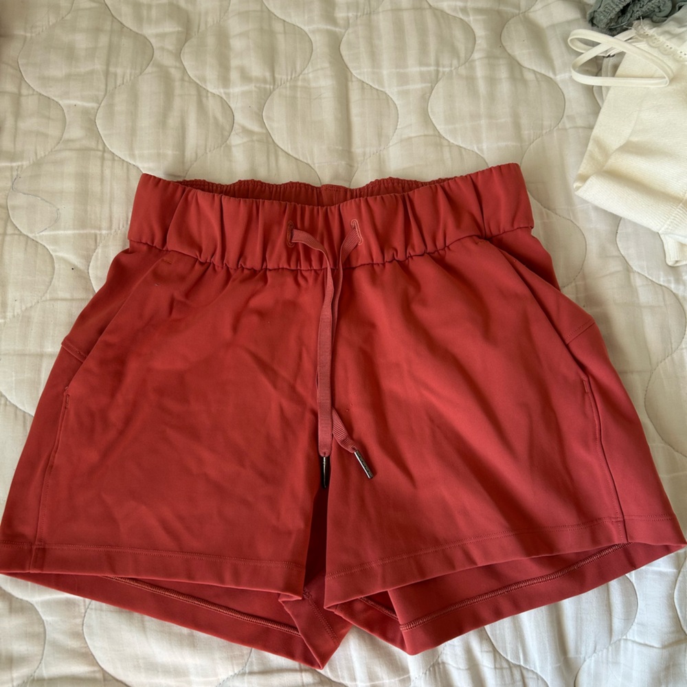 Lululemon Coral on the fly shorts